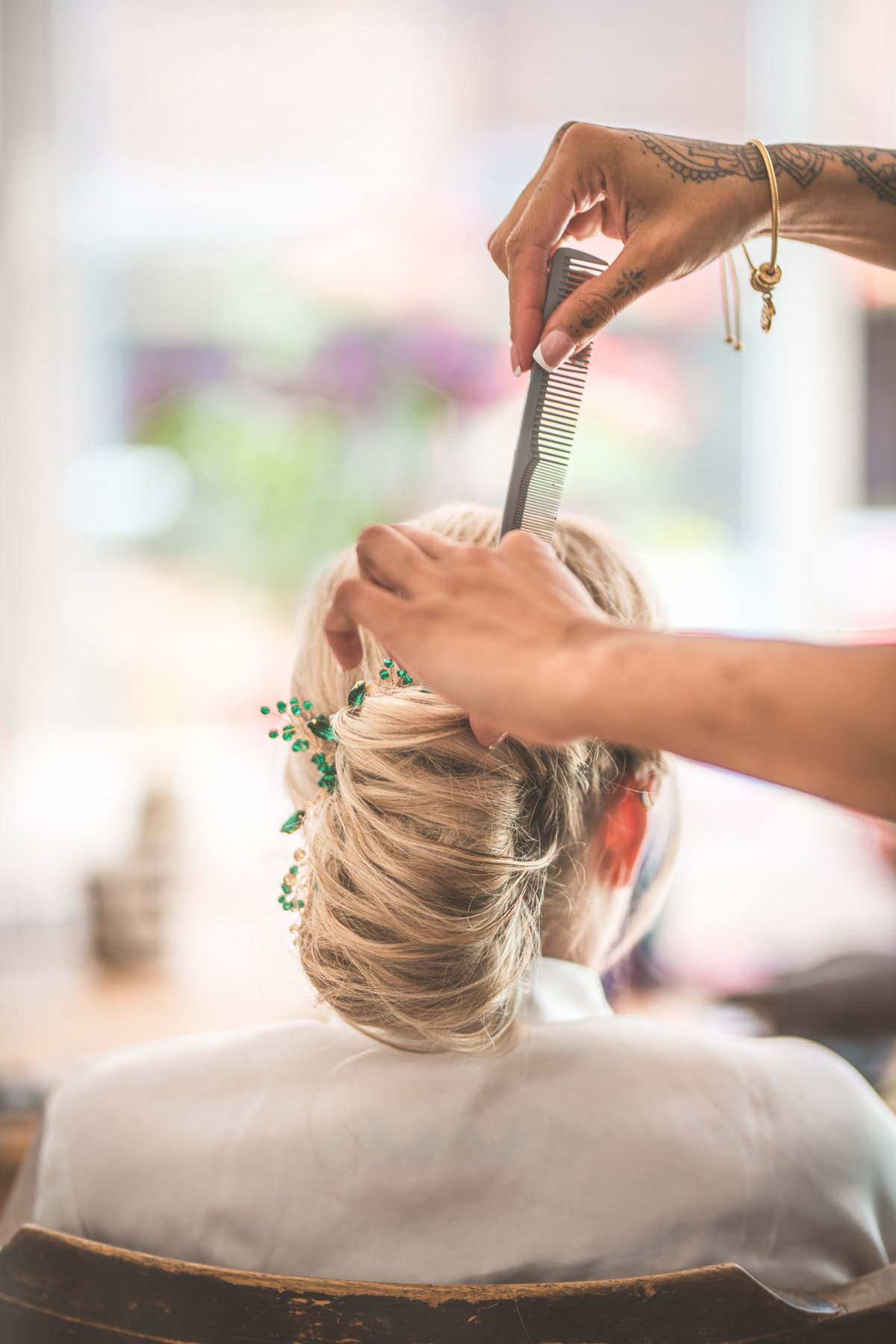 Bridal Hairstylist Dabouq - Expert preparing bride's hair