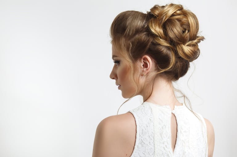 Elegant wedding hairstyle on a beautiful bride in profile